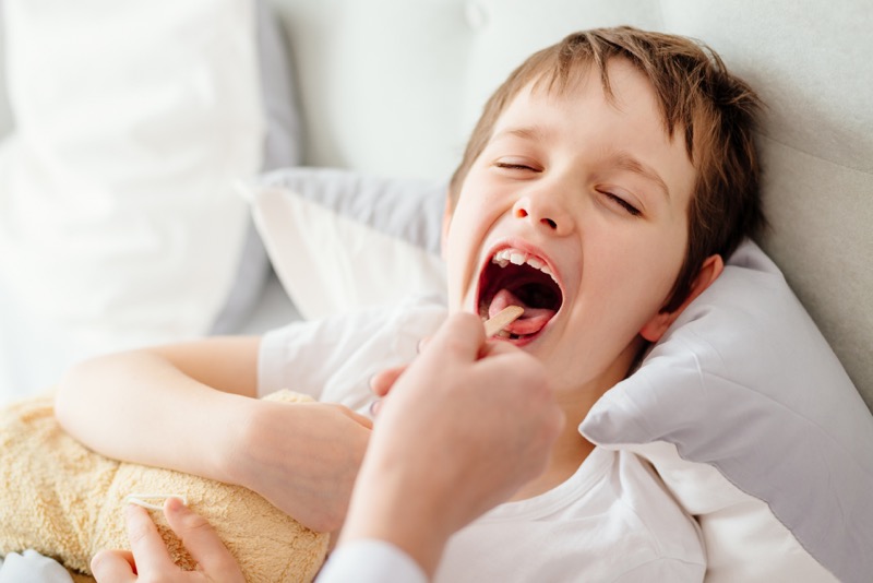 throat examination of a child